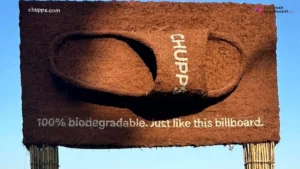 Chupps biodegradable billboard in Mumbai disintegrating in rain, symbolizing eco-friendly footwear
